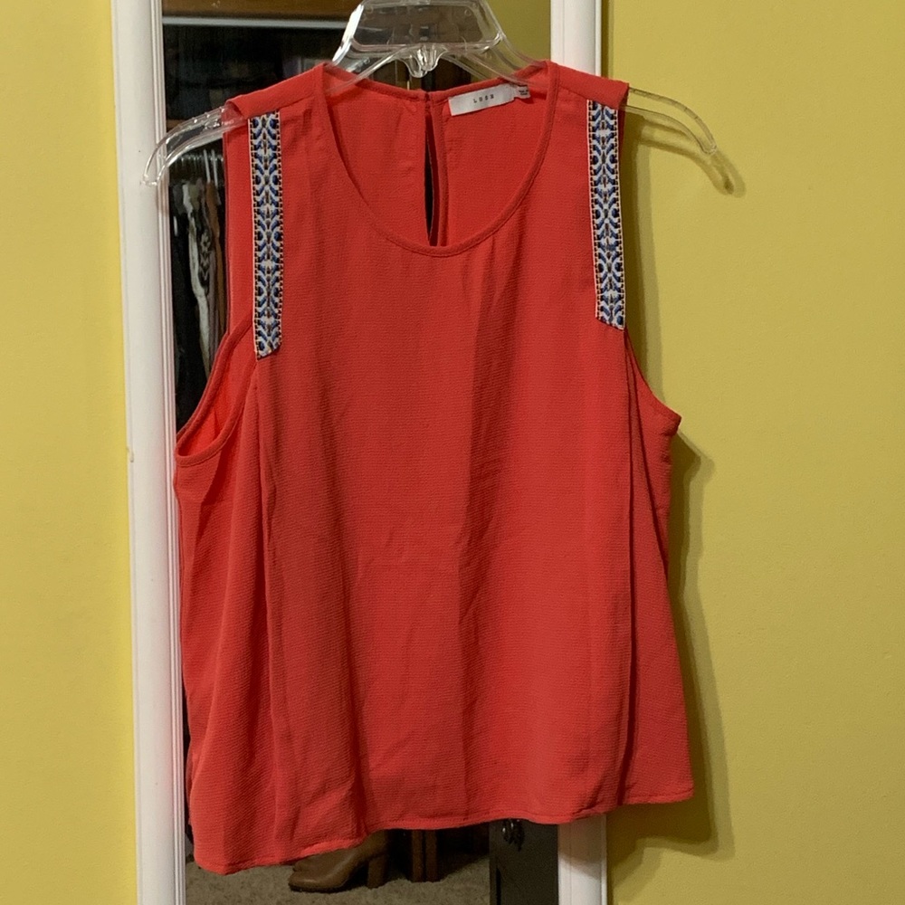 Lush Coral Top with Aztec Detail & Keyhole Back